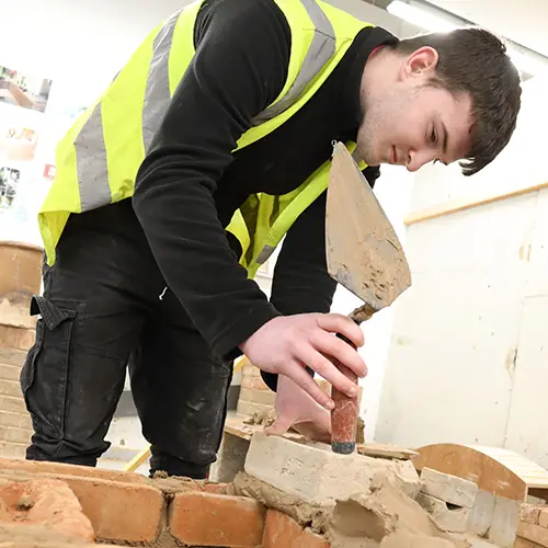 Bricklaying student