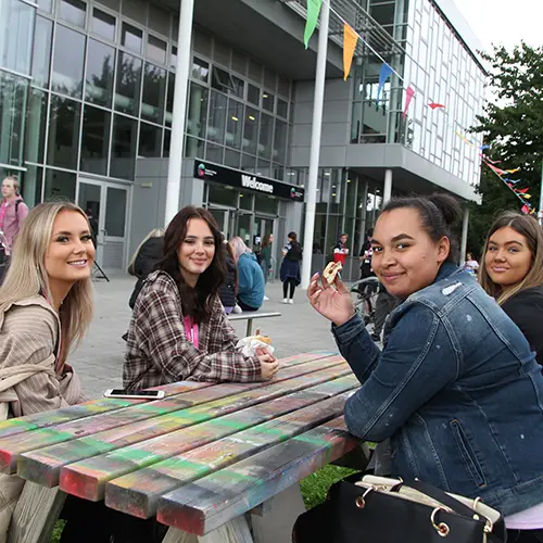 Students relaxing outside Chester Campus