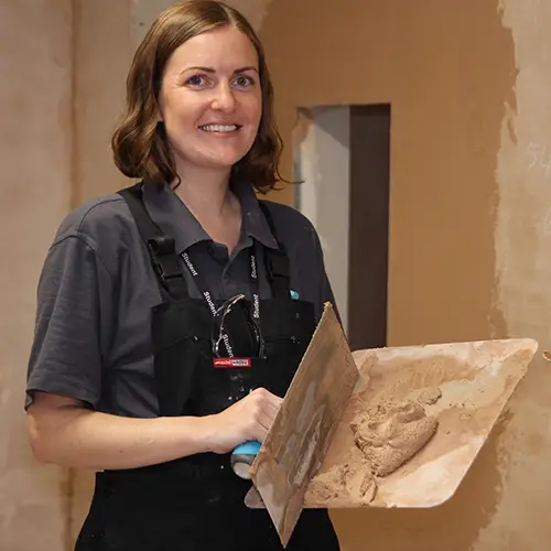 Plastering student