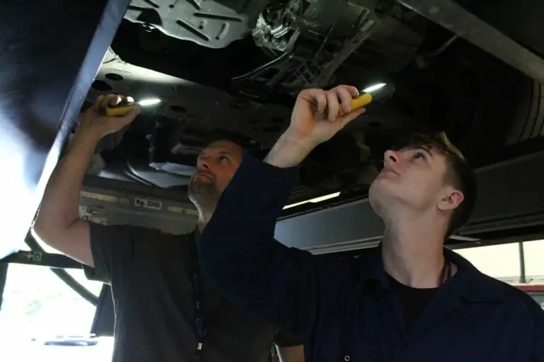 Motor Vehicle student using diagnostic tool